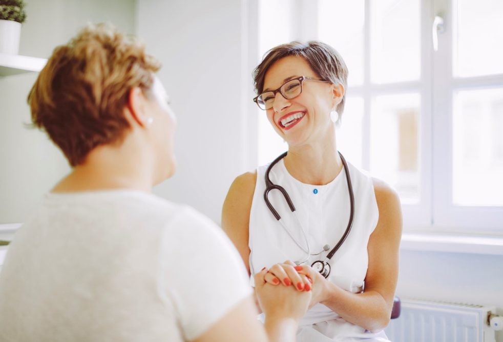 a woman visiting her gynecologist about perimenopause